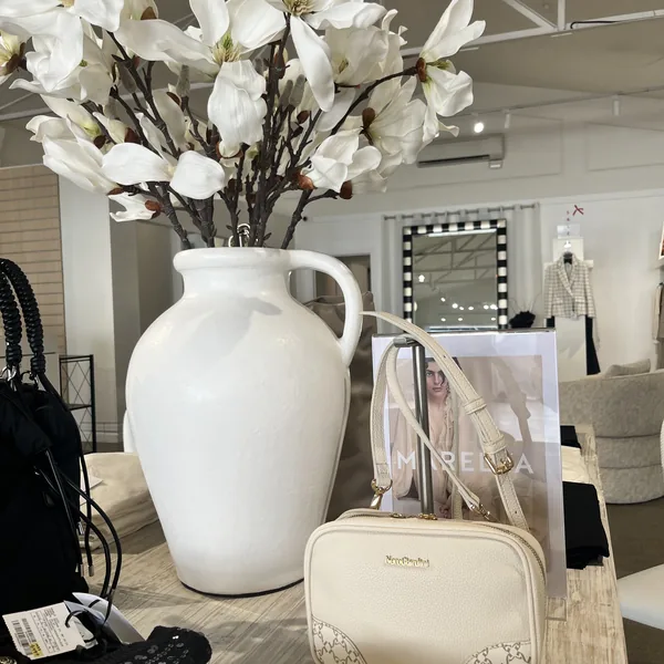 Nero Giardini cream crossbody bag styled at Lejose Fashion House