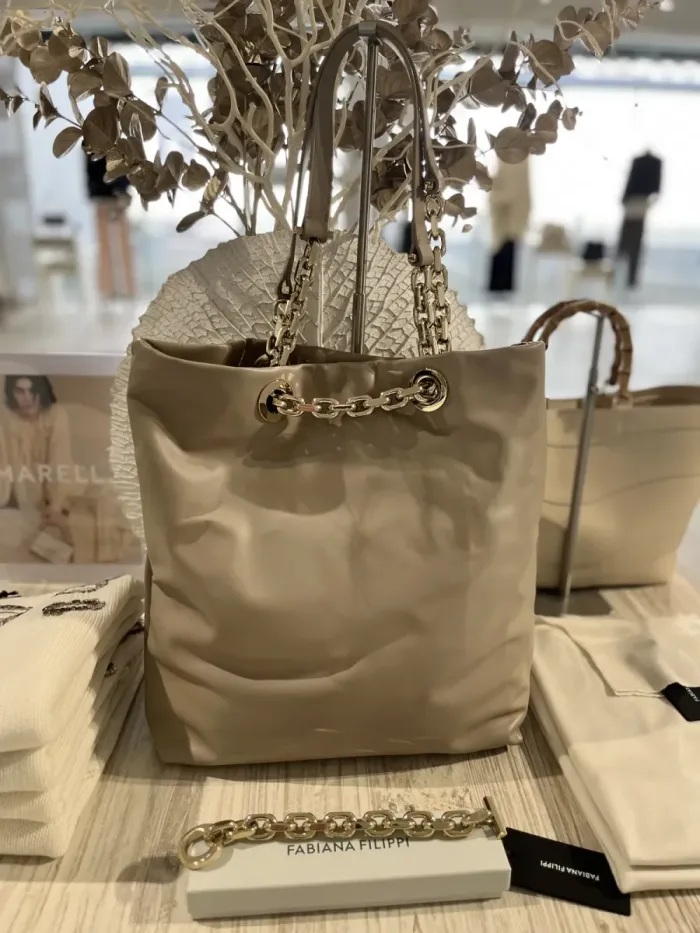 Fabiana Filippi chain-detail leather tote styled at Lejose Fashion House