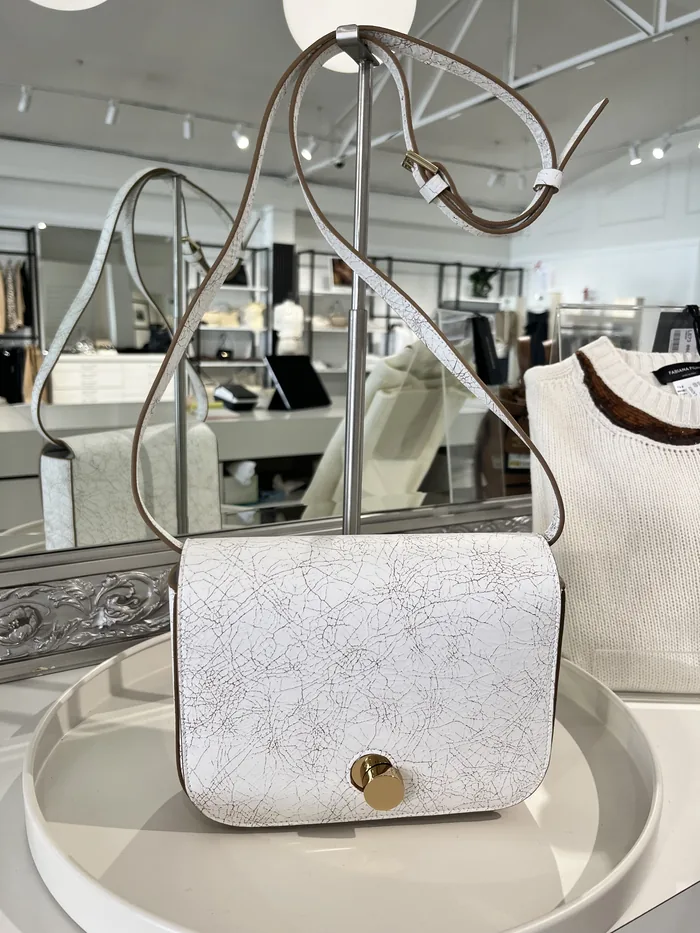 Nero Giardini white crossbody bag styled at Lejose Fashion House