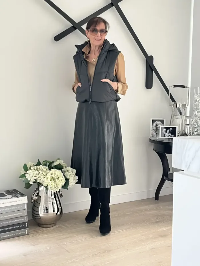 Leather skirt and statement coat styled at Lejose Fashion House