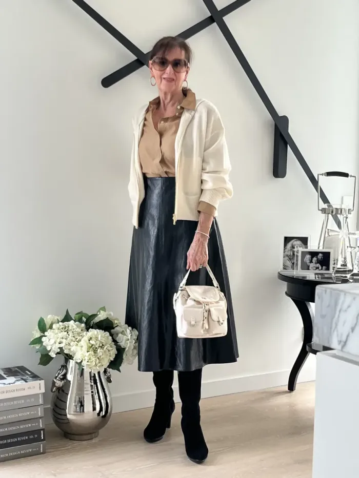 Cream jacket and leather skirt styled at Lejose Fashion House