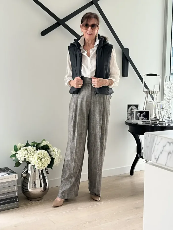 Plaid trousers and puffer vest styled at Lejose Fashion House