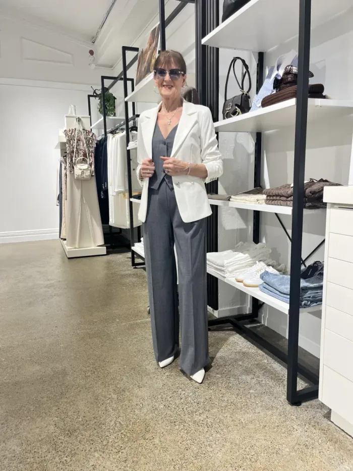 Ruffle blouse and cable knit cardigan at Lejose Fashion House Newmarket
