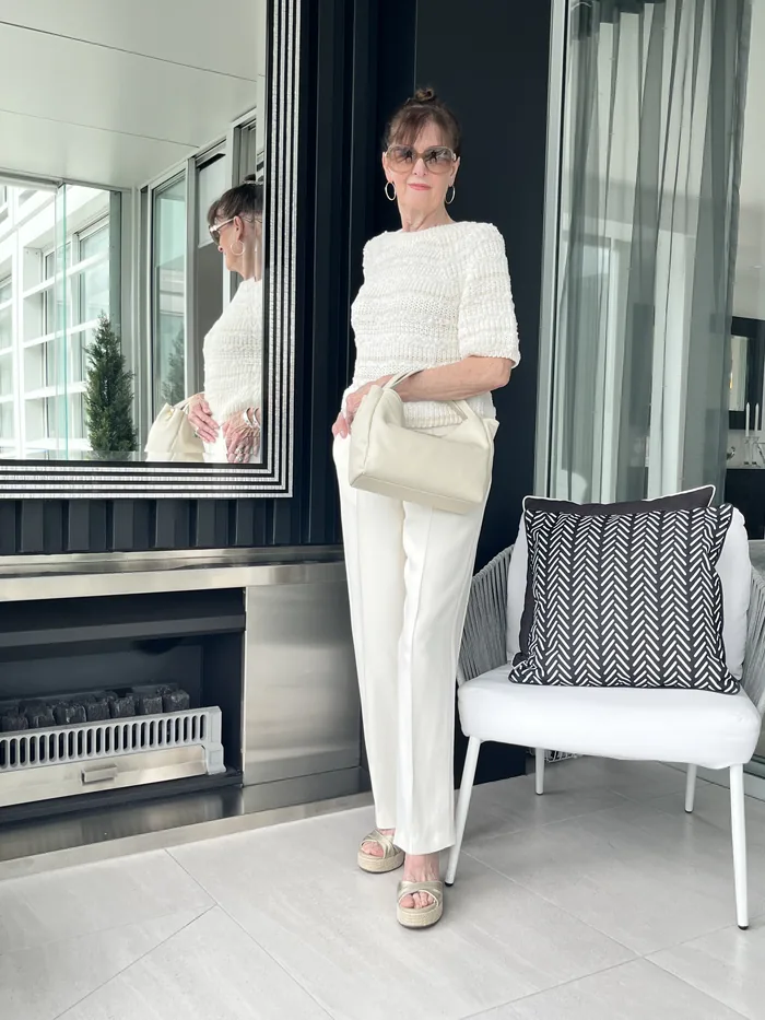 Gran Sasso knit top with Nero Giardini bag and Fabiana Filippi pant, styled at Lejose Fashion House